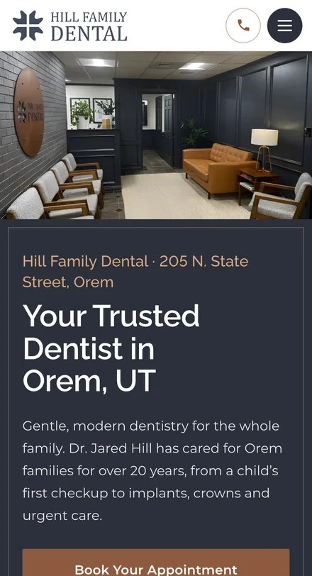 Hill Family Dental’s website on a phone: Your Trusted Dentist in Orem, UT, with a photo of the waiting room and a Book Your Appointment button